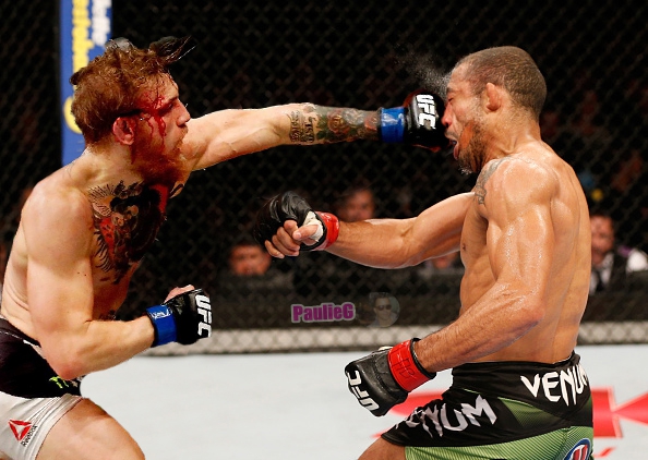 Conor McGregor versus Jose Aldo Fight MMA Photo