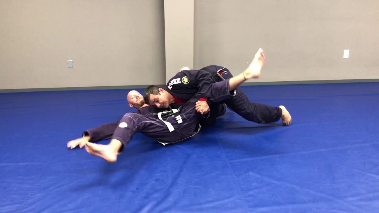 JiuJitsu techniques , Mount scape and half guard sweep . MMA Video